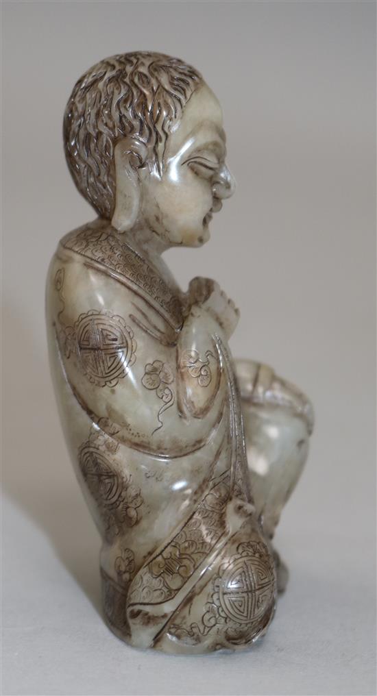 A Chinese soapstone seated figure of Luohan, 8.5cm